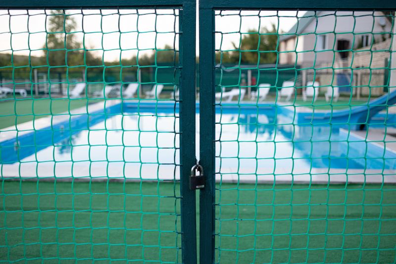 Mesh Fence Secured on Pool Deck